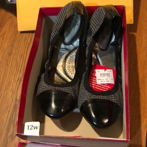 Gray and black, size 12 wide slip on shoes. Brand new still in box don’t fit me